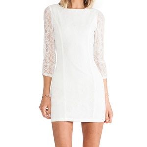 MM Couture White all over lace dress. Runs SMALL